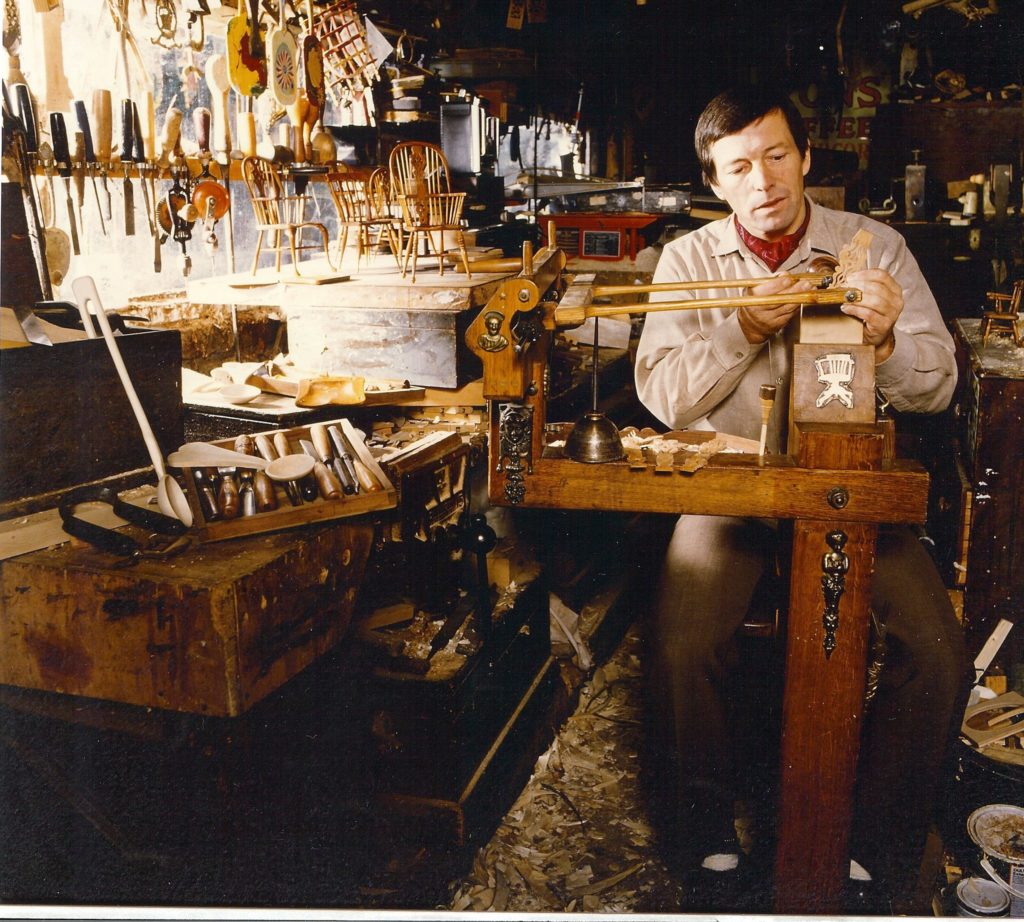 Stuart king using a marquetry cutter's donkey to produce components for his then range of miniature Windsor chairs c1982