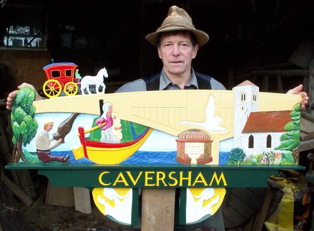 Stuart King with the Caversham sign